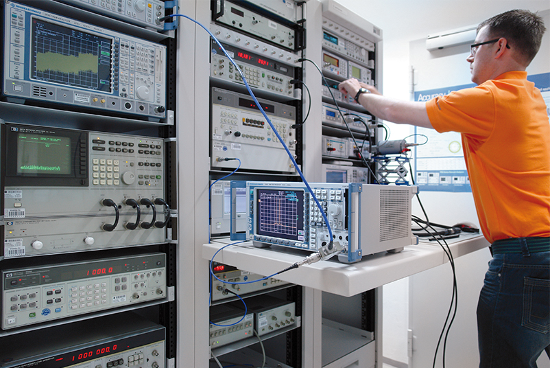Technician performs electrical EMC calibration
